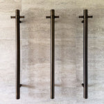 Notorious Single Bar Heated Towel Rail Antique Brass as shown in project Waterways