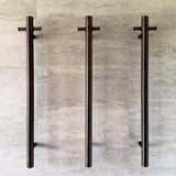 Notorious Single Bar Heated Towel Rail Antique Brass as shown in project Waterways