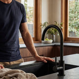 Notorious Collective Pull Out Kitchen Laundry Mixer shown in a modern kitchen