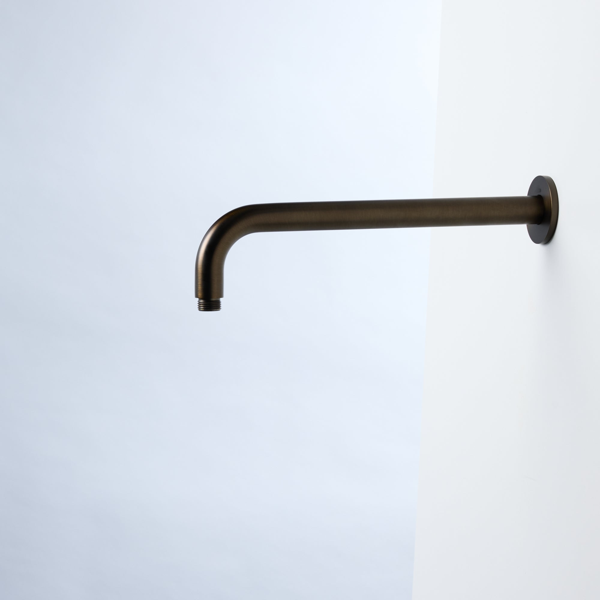 Notorious Round Wall Mounted Shower Arm Antique Brass