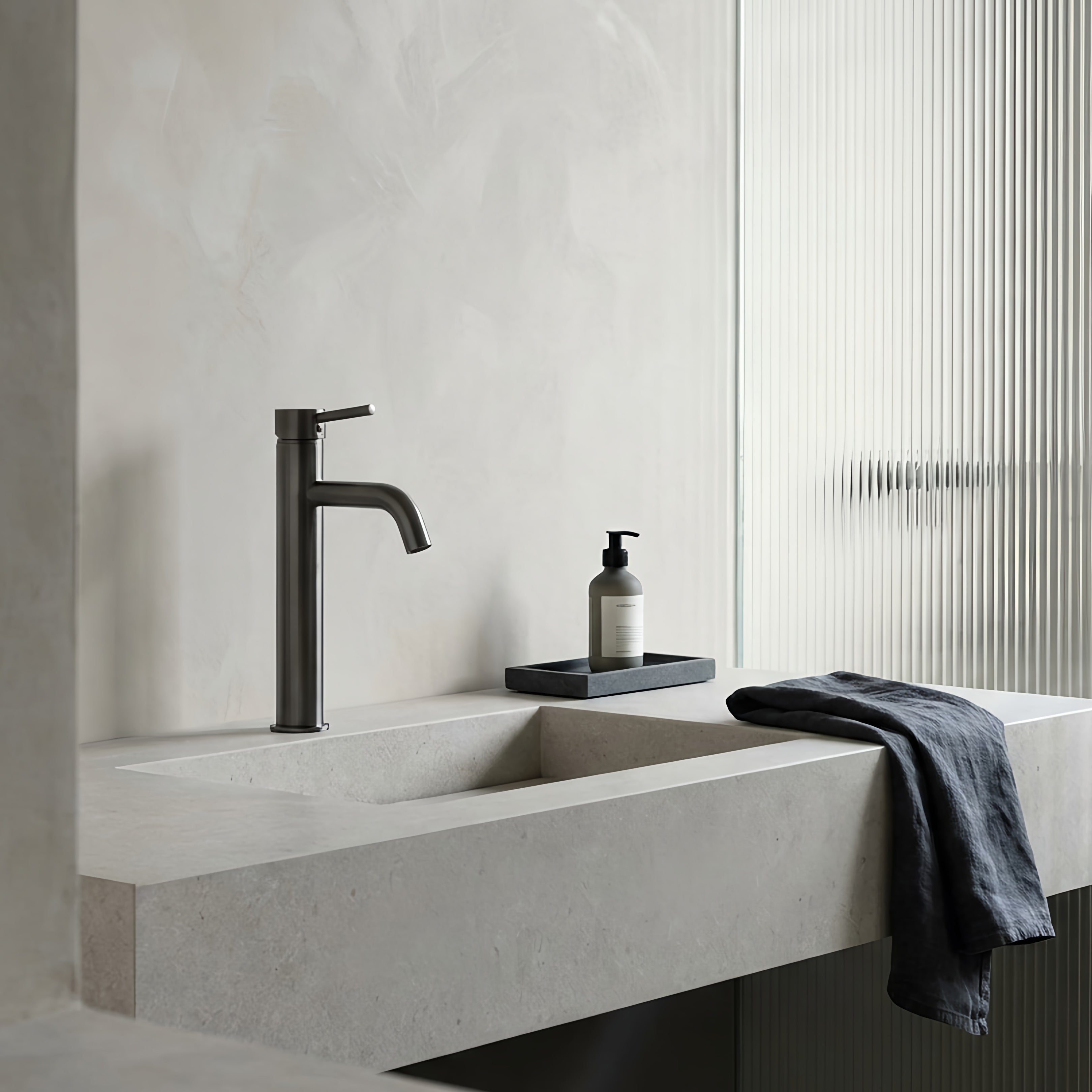 Modern bathroom with the gun metal tall basin mixer