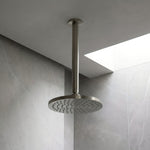 Brushed Nickel shower arm shown with shower head in a neutral shower area