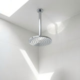 Chrome ceiling arm shown with shower head in a bathroom 
