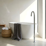 Modern bathroom with a freestanding bathtub, with Chrome floor spout.