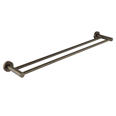 an antique brass double towel rail wall mounted set against a white background