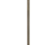 an antique brass floor bath spout, with a curved design, set against a white background