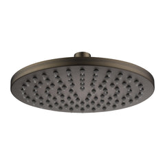 An antique brass shower head on a white background