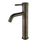 antique brass tall basin mixer tap on a white background