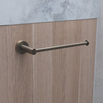 antique brass hand towel holder rail on a oak timber vanity background