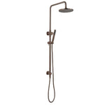 Antique brass twin shower with diverter on a white background