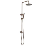Antique brass twin shower with diverter on a white background