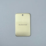 Brushed gold sample disc on a white background