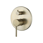 Brushed gold wall mounted mixer with diverter on a white background