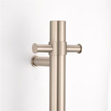 brushed nickel single upright bar heated towel rail on a white background lifestyle