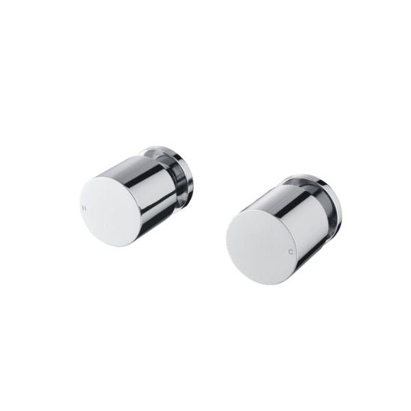 Two chrome round wall taps on a white background