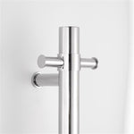 chrome single upright bar heated towel rail on a white background lifestle