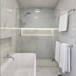 a chrome single towel rail on a marble wall backgroud