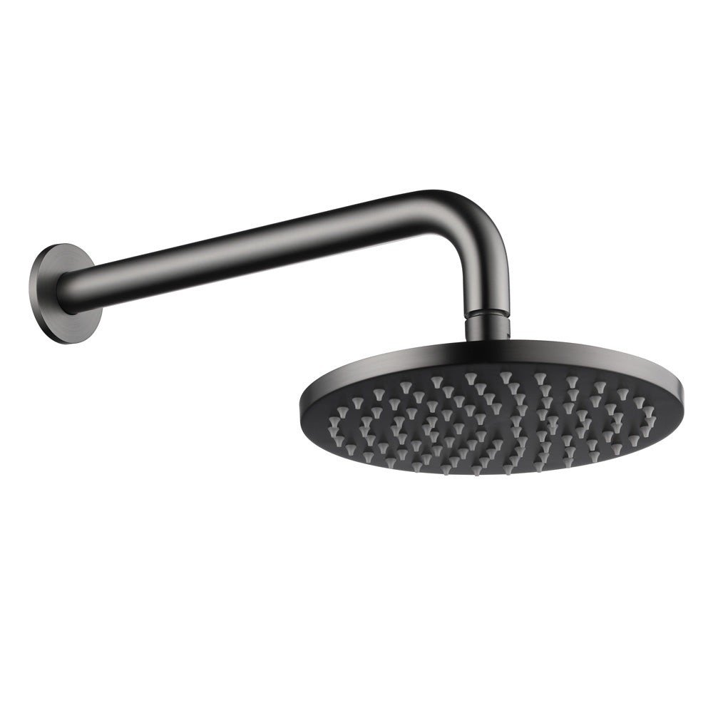 gunmetal round shower head on wall with a white background
