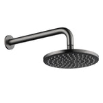 gunmetal round shower head on wall with a white background