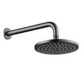 gunmetal round shower head on wall with a white background
