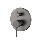 A wall-mounted gun metal mixer with diverter with a round base and two control knobs on the front on a white background.
