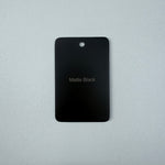 Matt Black sample disc on a grey background
