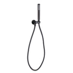 A matt black shower handpiece mounted on a bracket, with a hose attached to it on a white background