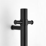 close up of matt black single upright bar heated towel rail on a white background