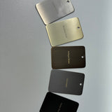 Five metal color samples labeled 'Warm Brushed Nickel', 'Brushed Gold', 'Antique Brass', 'Gun Metal', and 'Matt Black' on a grey background.