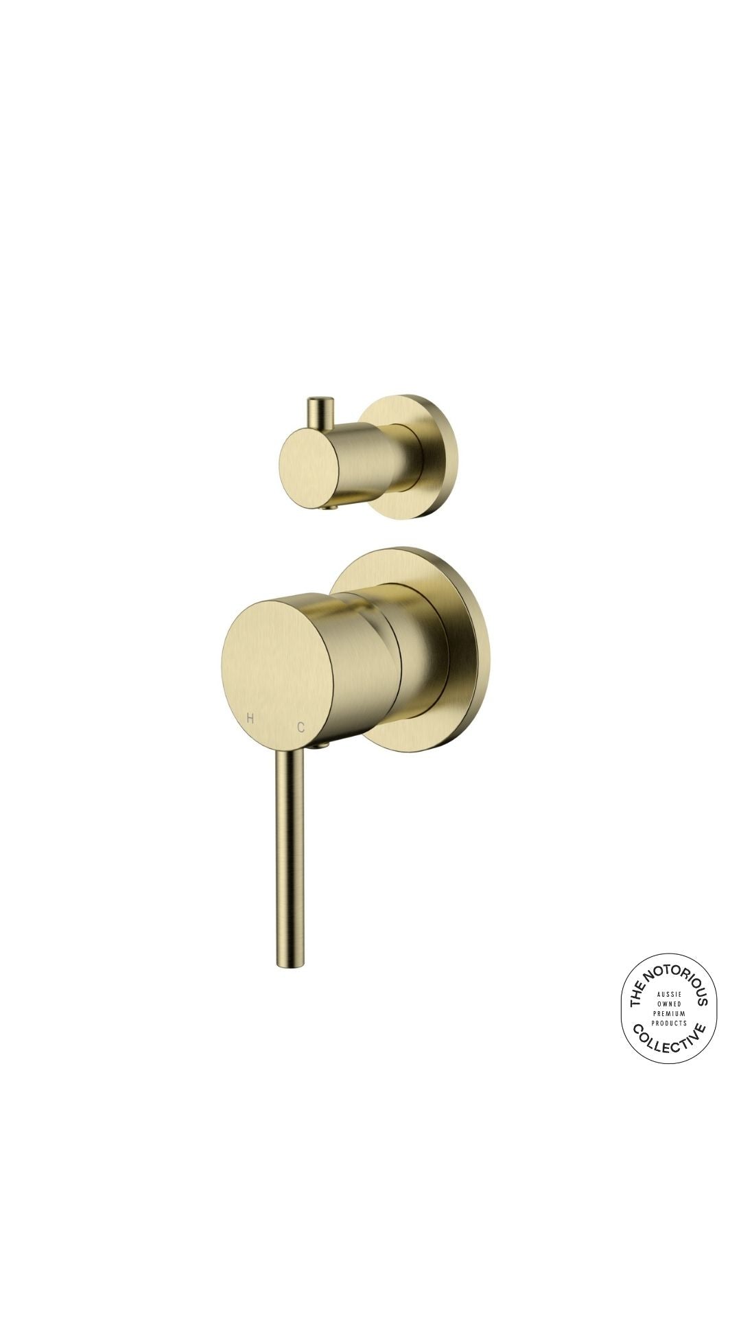 Brushed gold wall mixer with diverter on a white background