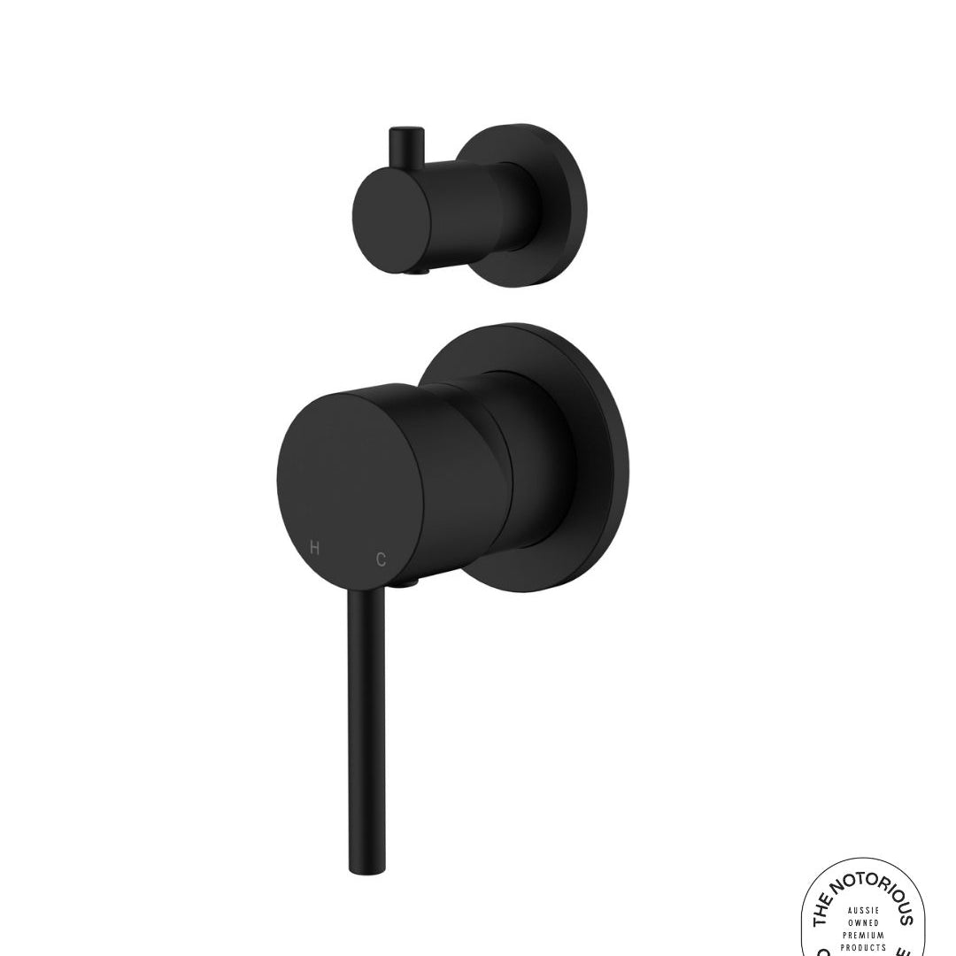 Matt black wall mixer with diverter on a white background